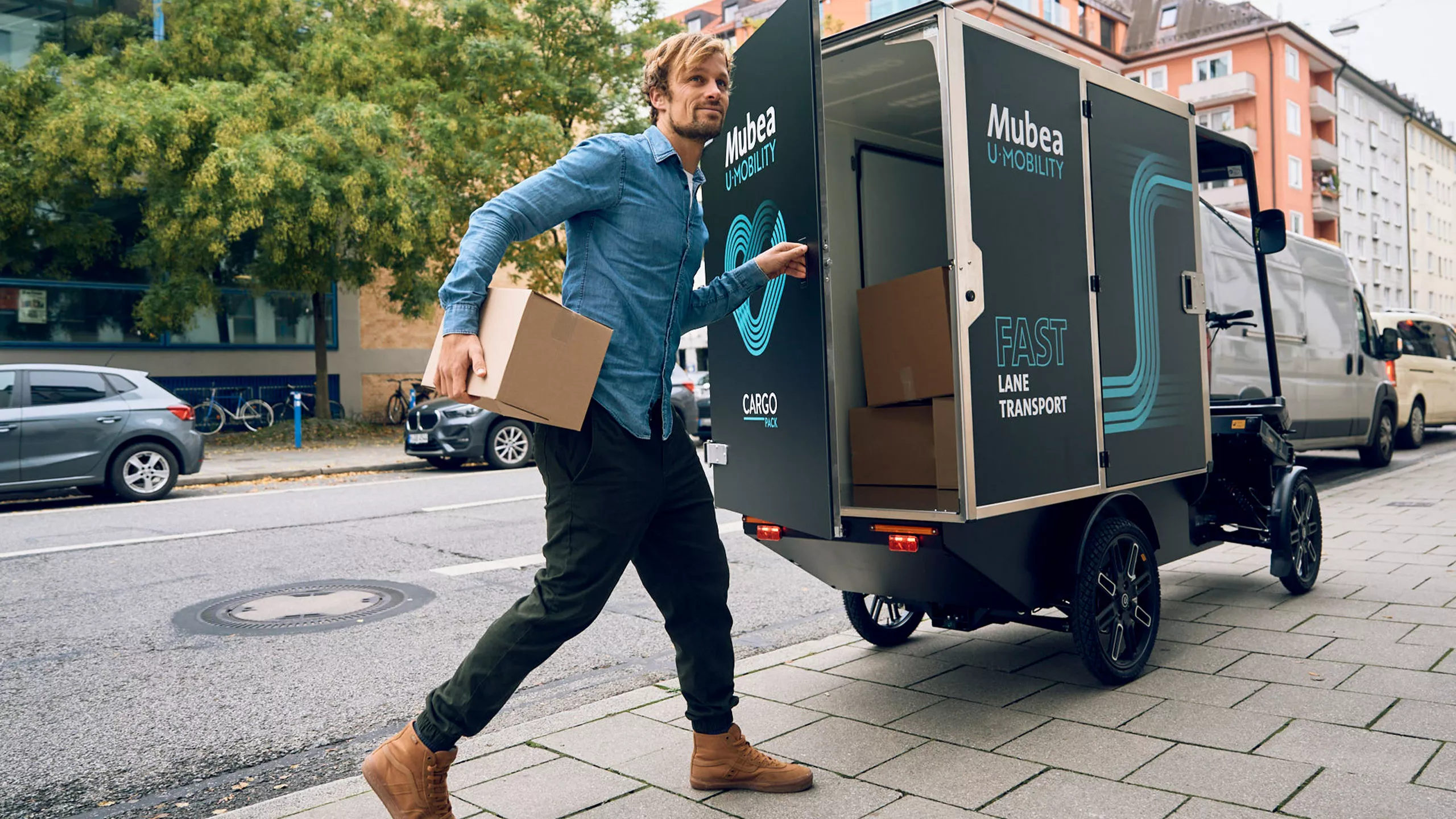 A man delivers parcels from a cargo pack on an urban street.